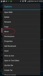 Long click file and click "Move".